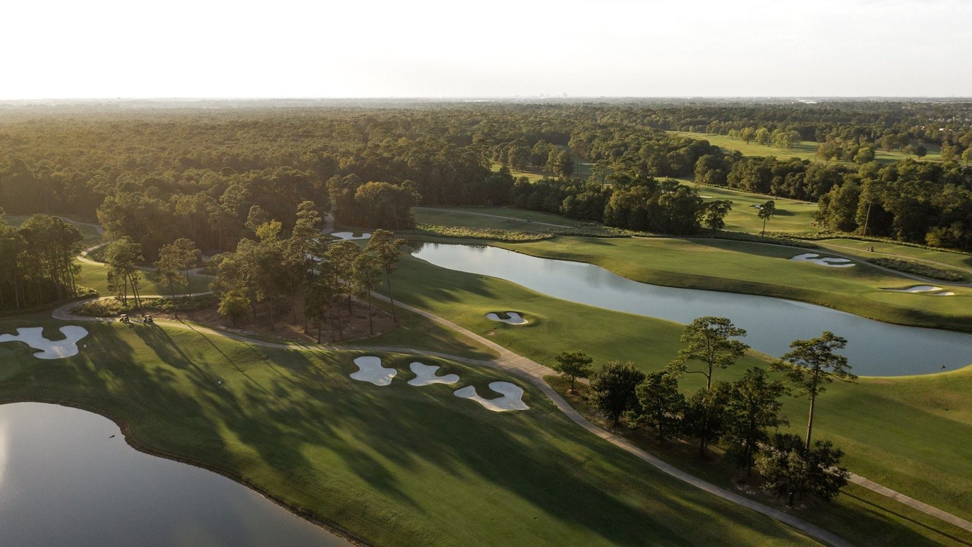 Aerial view of water hazards and bunkers on the Golf Club of Houston Tournament Course in Humble.