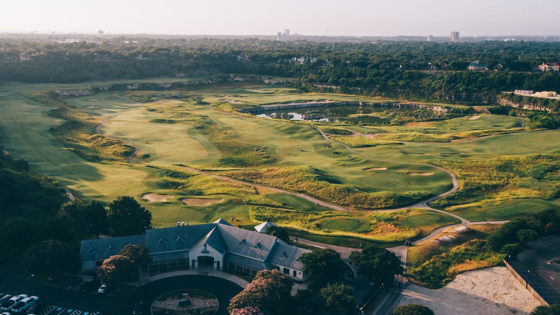 Aerial view of The Quarry Golf Course and its limestone quarry landscape in San Antonio.