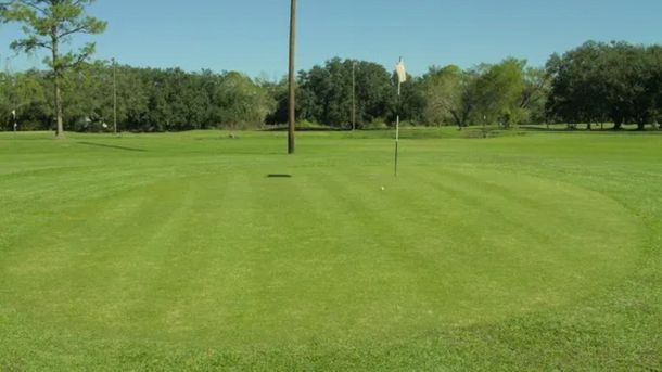 Flag on the first green at Melrose Park Golf Course in Houston.